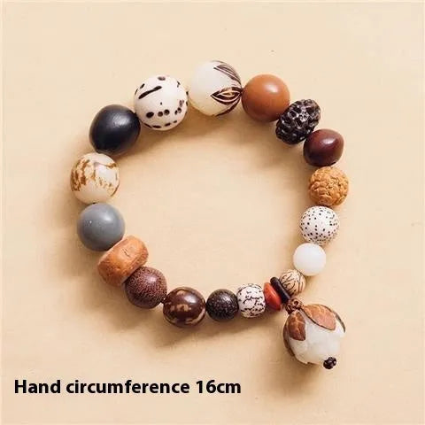 Handcrafted 18-seed Bodhi bead bracelet with geometric design on 16cm wrist