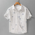 Women's loose fit short sleeve cotton cardigan shirt in light green, light pink or white.