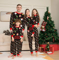Family Christmas matching pajamas set in cotton plaid print showing coordinated adult, child and pet sizes