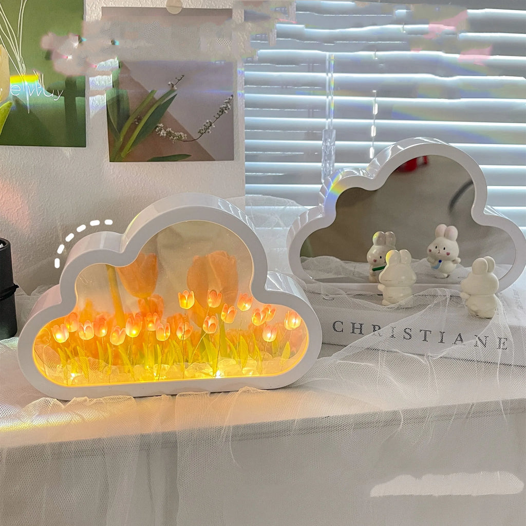 Cloud-shaped tulip night lamp with LED lights and integrated mirror on a table