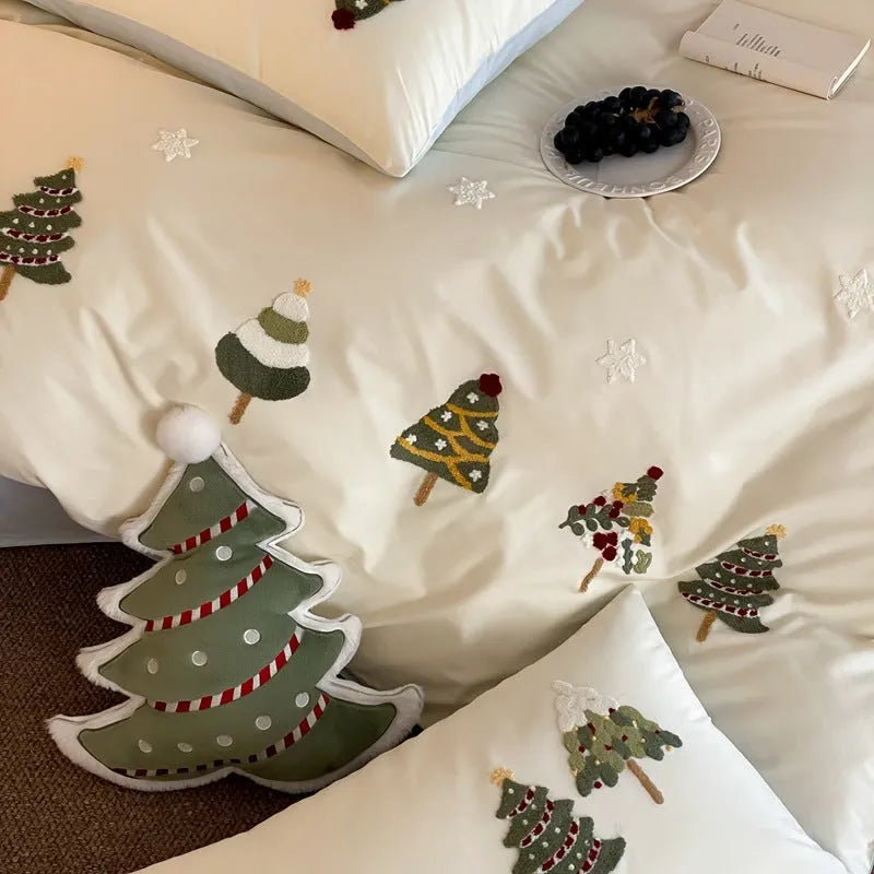 Pure cotton four-piece bedding set with embroidered Christmas tree towel decoration on duvet cover.