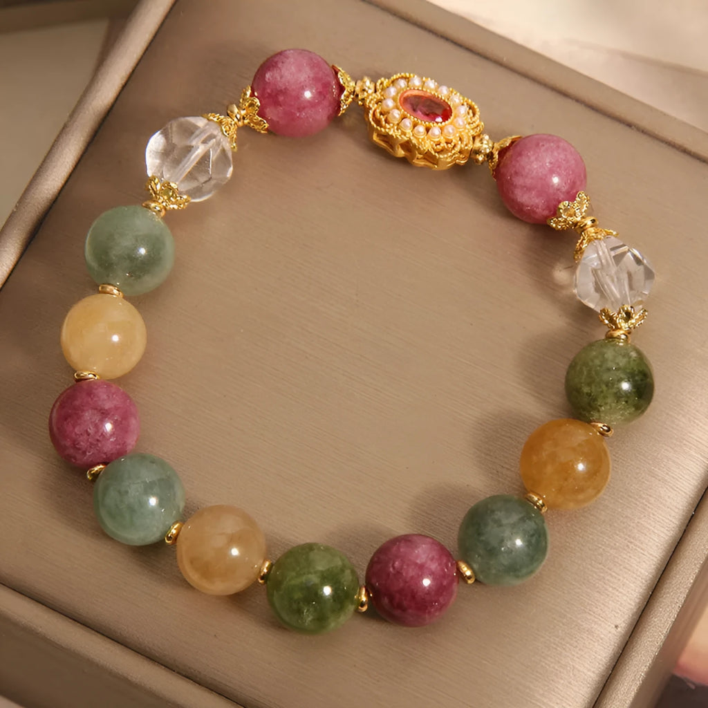 Women's jade colour tourmaline alloy bracelet with round beads on pearl crystal base and rhinestone accents