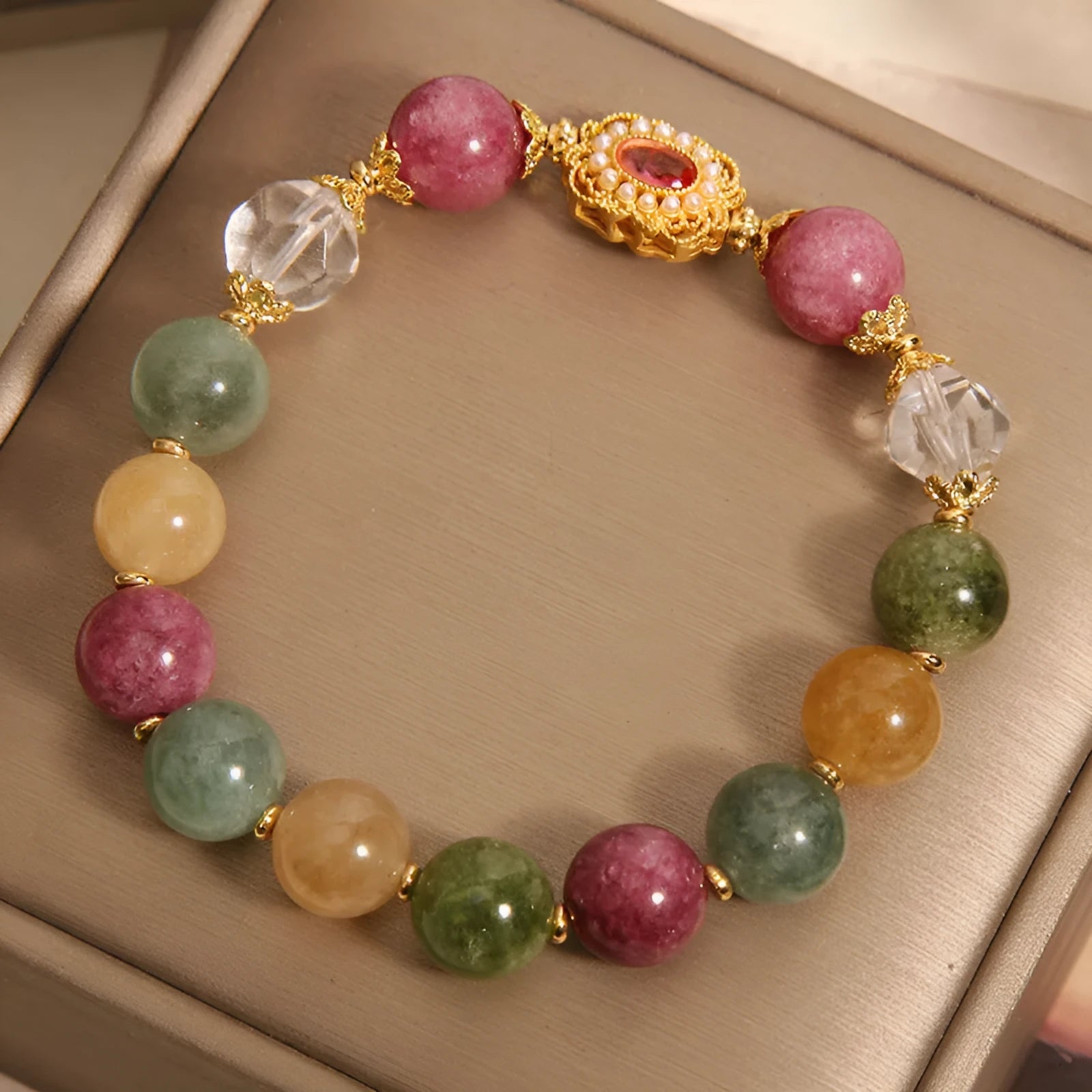 Women's jade colour tourmaline alloy bracelet with round beads on pearl crystal base and rhinestone accents