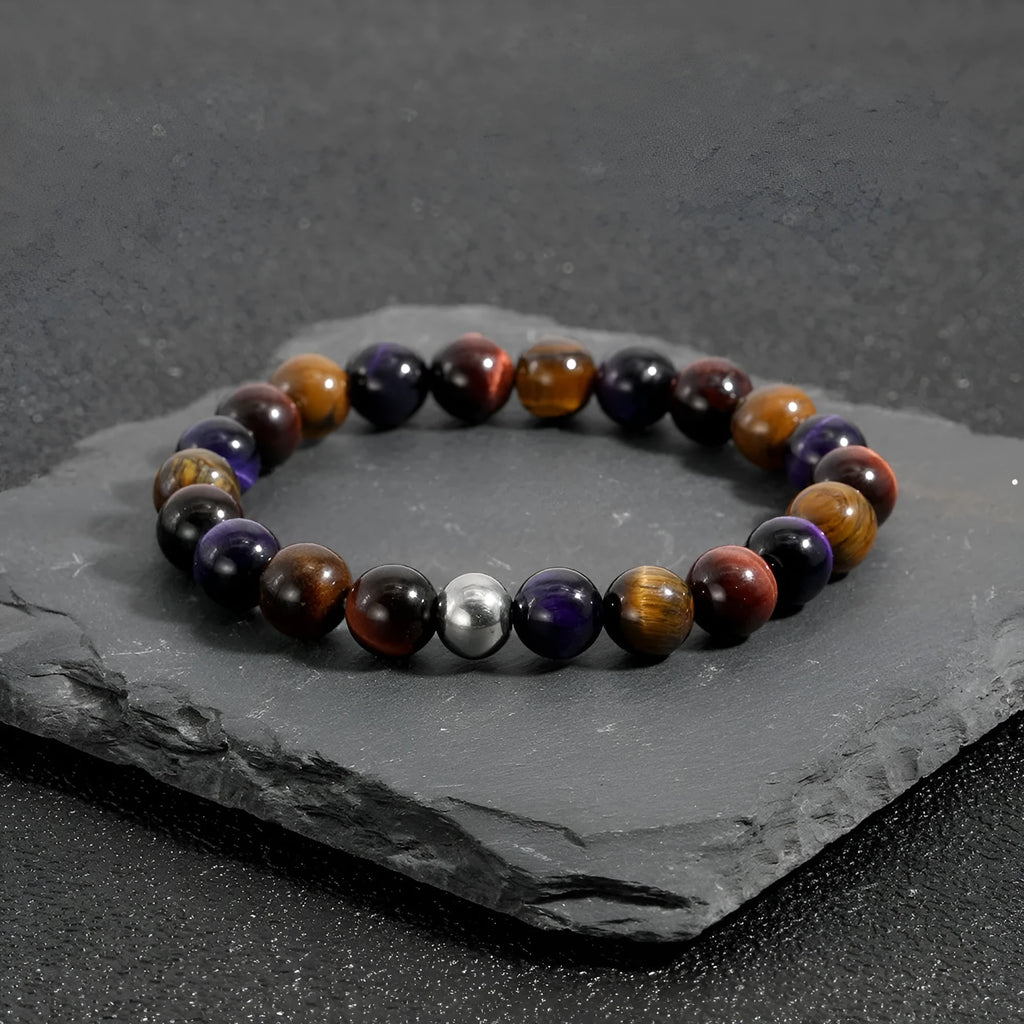 Handmade elastic bracelet with natural tiger-eye stone beads in a geometric minimalist design.