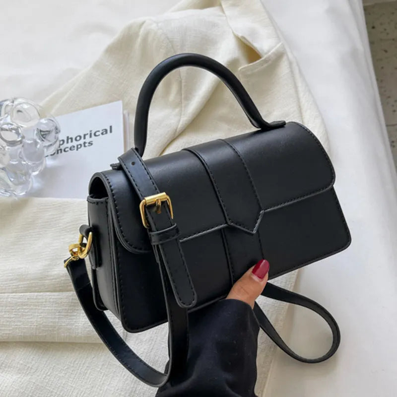 Women's PU leather messenger bag in horizontal square shape with sandwich pocket and file organisation