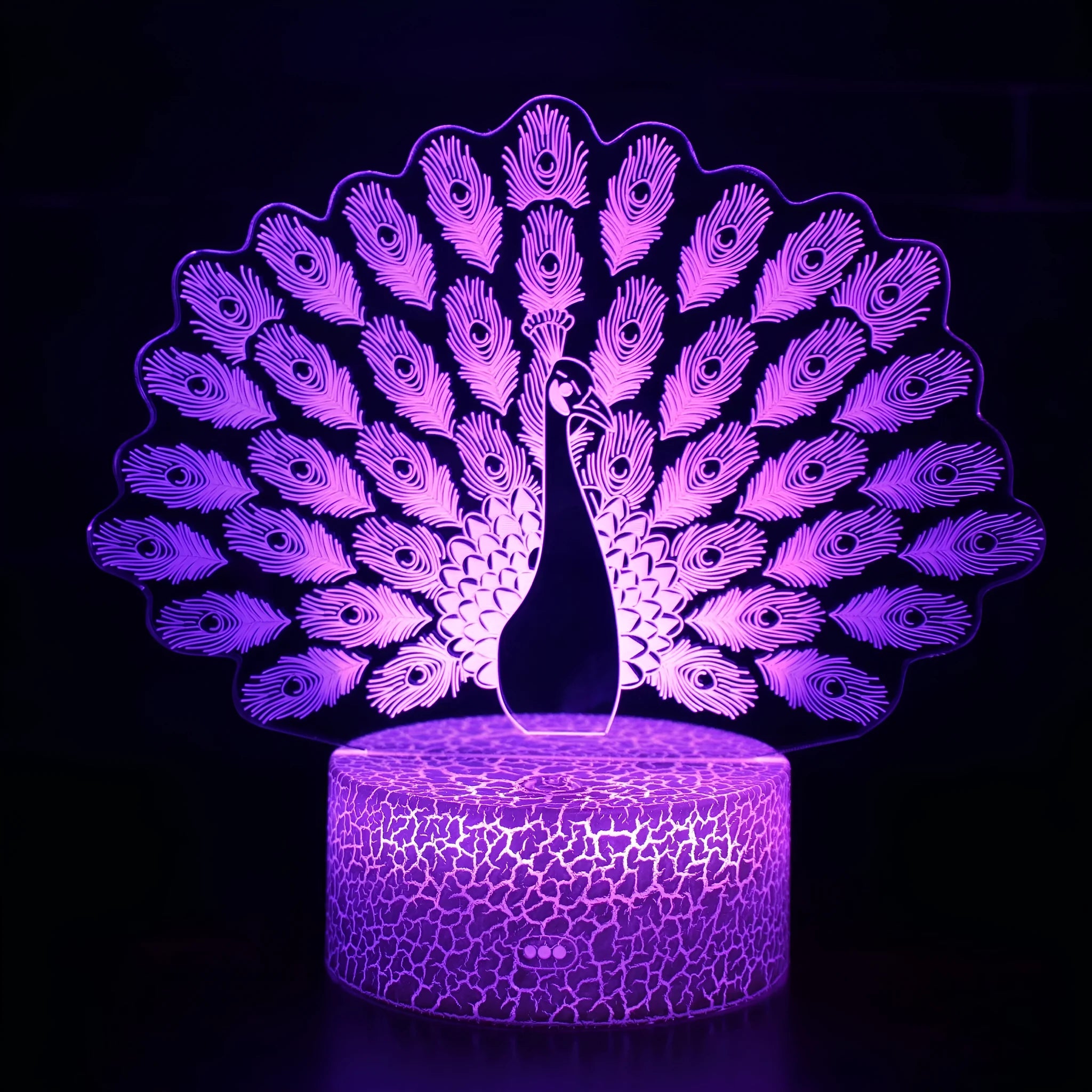 Small acrylic 3D USB table lamp with colourful glow on a rectangular black ABS base, showing touch controls.