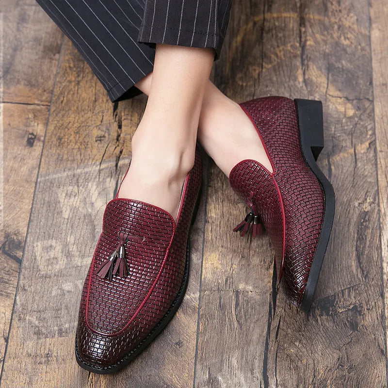 Men's black pointed toe slip-on shoes with tassel detail for business wear