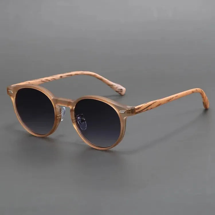 Retro round rim sunglasses with frosted frame and UV-protective lenses in multiple colour options.