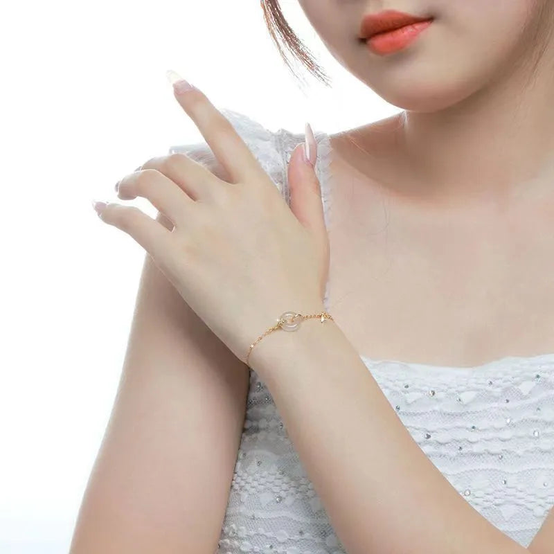 Women's silver bracelet with gold plating and white chalcedony starry sky design