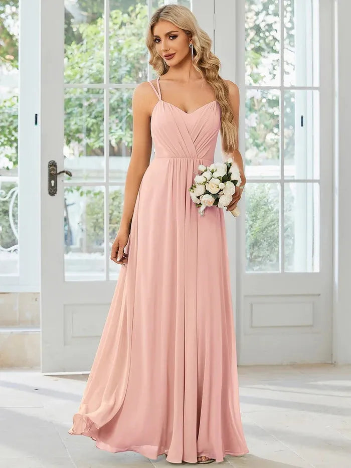 Women's sleeveless sling neckline banquet dress with long pleated A-line skirt