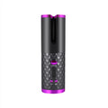 A white portable curling iron with a USB charging port and a gold ceramic barrel on a stand.