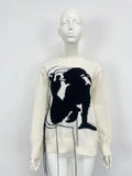 Women's loose grey alpaca wool pullover sweater with tassel detailing and round neck