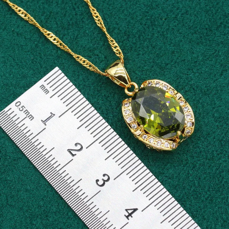 Olive green rhinestone zircon jewellery set with snake bone chain necklace, matching earrings, and ring.