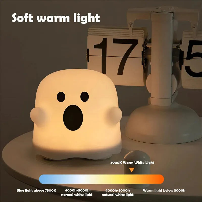 White silicone LED night light with touch sensor base and portable handheld design