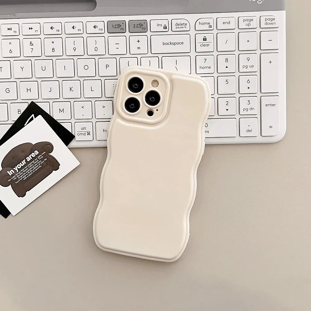Solid colour air cushion silicone phone case for iPhone in black with wave pattern