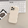 Solid colour air cushion silicone phone case for iPhone in black with wave pattern