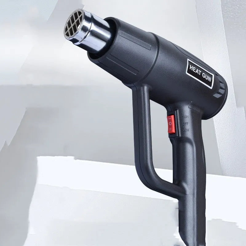 2000W industrial hot air gun with anti-slip grip, dual temperature gears, and grid air outlet.