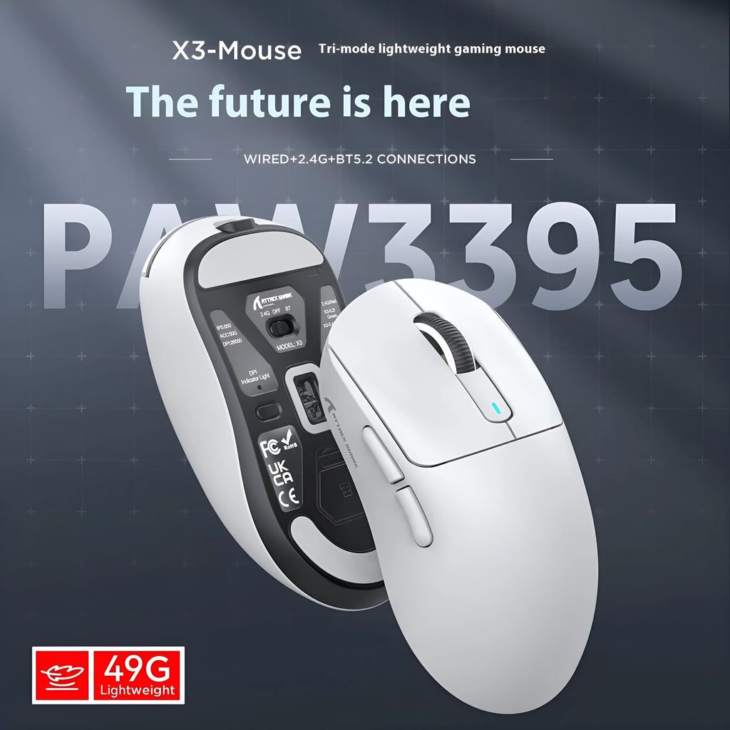 Black rechargeable Bluetooth mouse with USB receiver and coiled parachute cable on a desk.