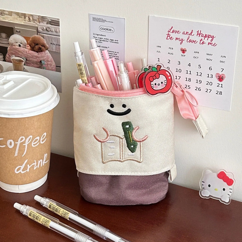 Brown and green cartoon design collapsible pencil case made from oxford fabric.