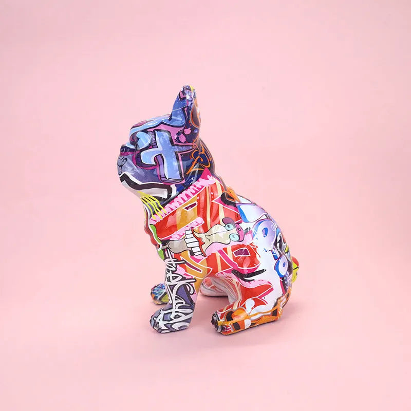 Graffiti-coloured French bulldog resin statue on a shelf, showing modern simple style.