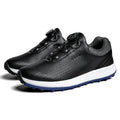 Men's white and black breathable golf shoes with non-slip broken nail sole and round toe.