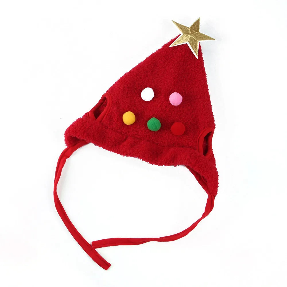 Christmas pet costume with white reindeer antler hat and green velvet bib on small pet