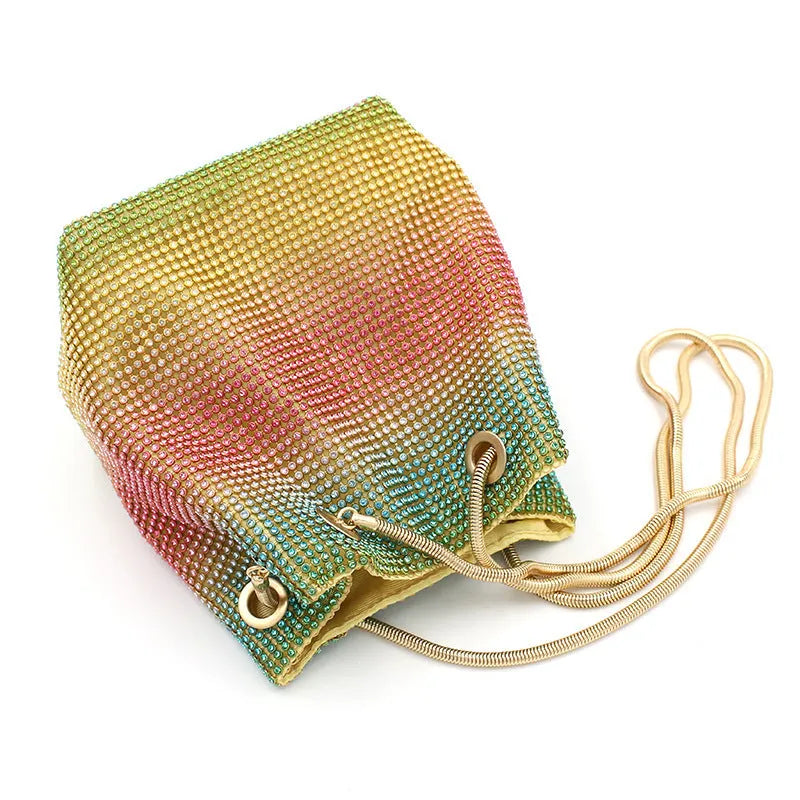 Colourful rhinestone bucket bag with sparkly fabric, shown as a handbag and shoulder bag.