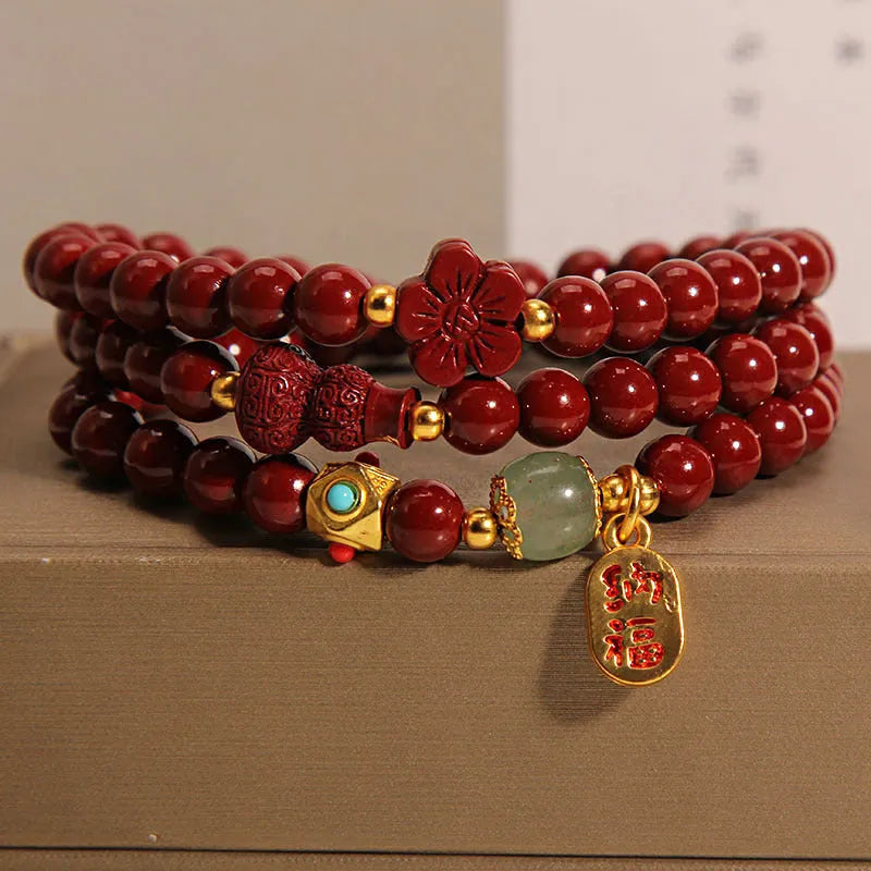 Red cinnabar bracelet with multi-circle gourd and five-petal flower geometric design
