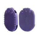 Purple dual-sided pet massage shampoo brush with soft TPR bristles and ergonomic handle