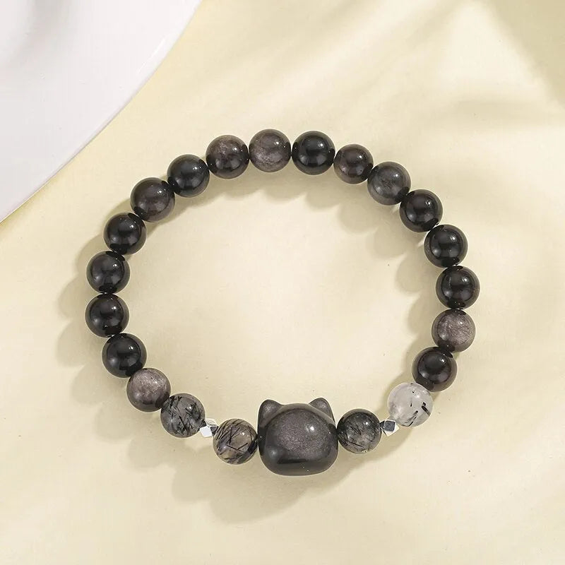 Natural obsidian couple bracelet with cat crystal charm in silver stone or white agate colour.