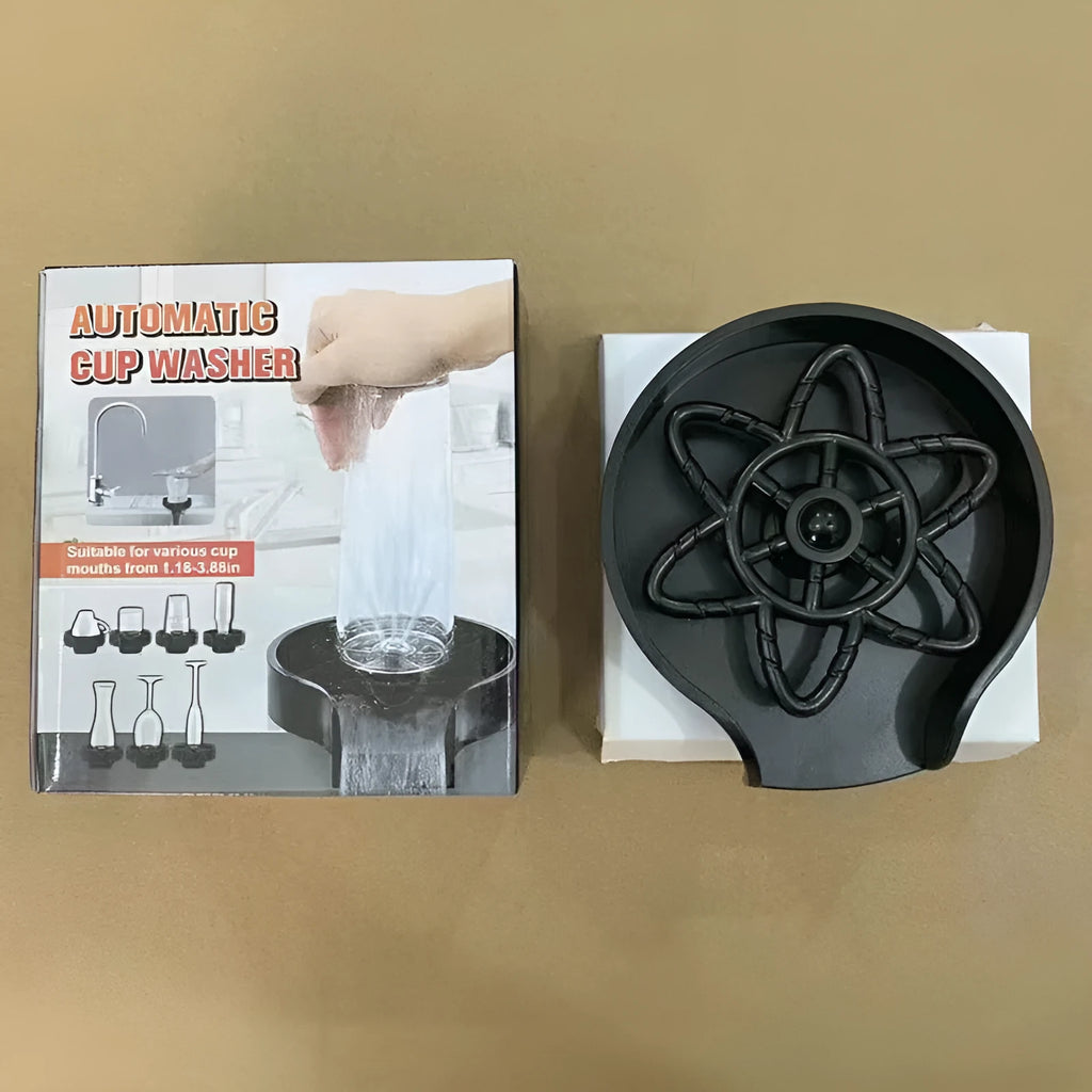 Black plastic household press type high pressure automatic cup washer on kitchen counter