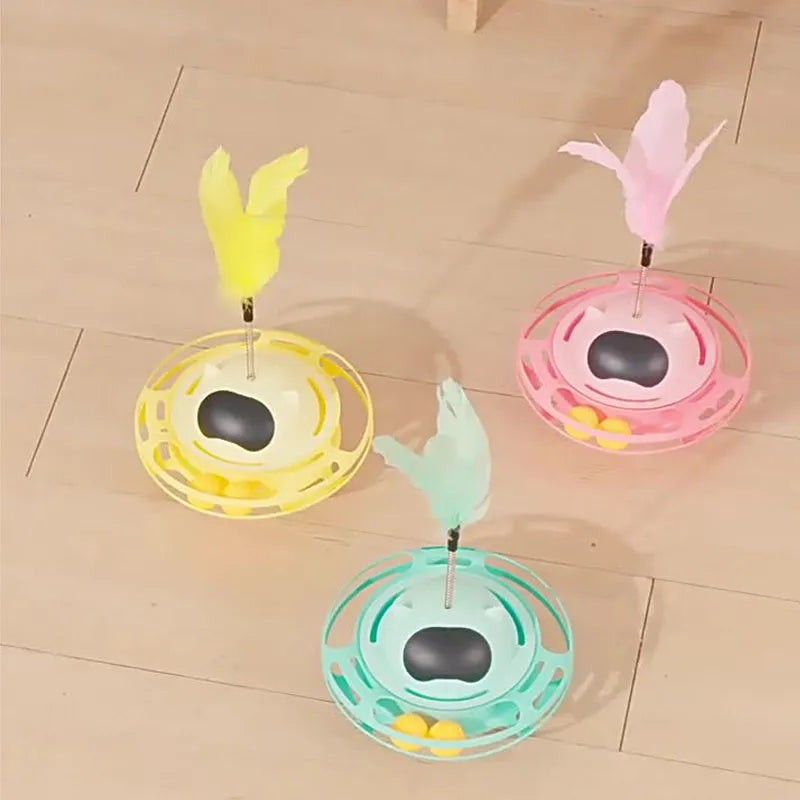 Pink cat tumbler turntable interactive toy with colourful ball inside, dimensions 17cm by 10cm