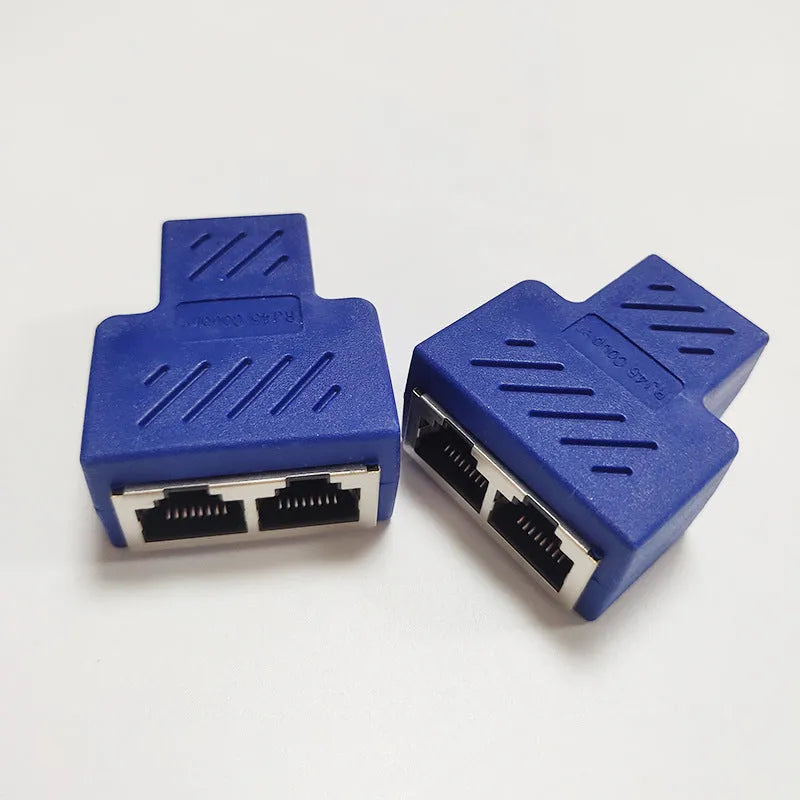 RJ45 network tee splitter adapter in multiple colours, showing one input and two output ports.