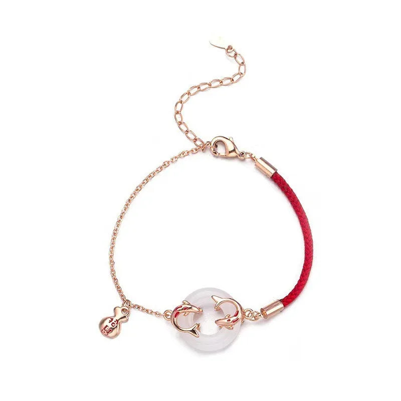 Festive koi bracelet with red rope design and peace buckle closure