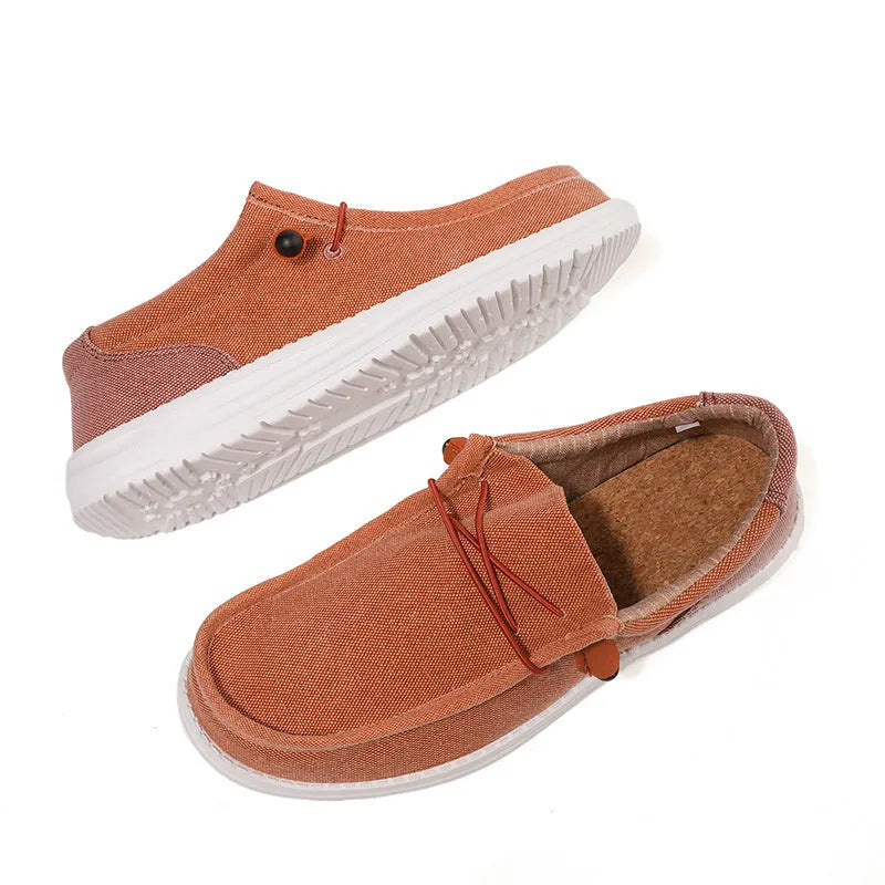 Men's orange and green canvas casual trainers with rubber soles and mosaic design details