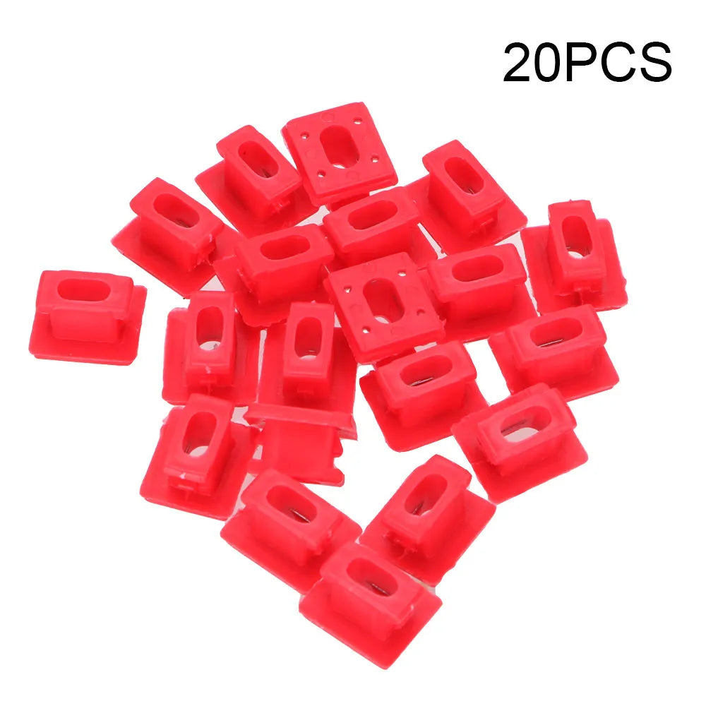 Ten black plastic BMW interior door trim panel clips on a white background