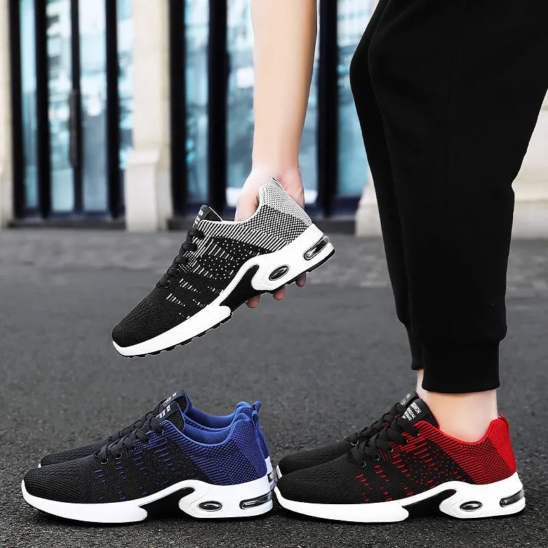 Men's low-top Flyknit mesh sneaker in black and grey colour with lace-up front and soft sole.