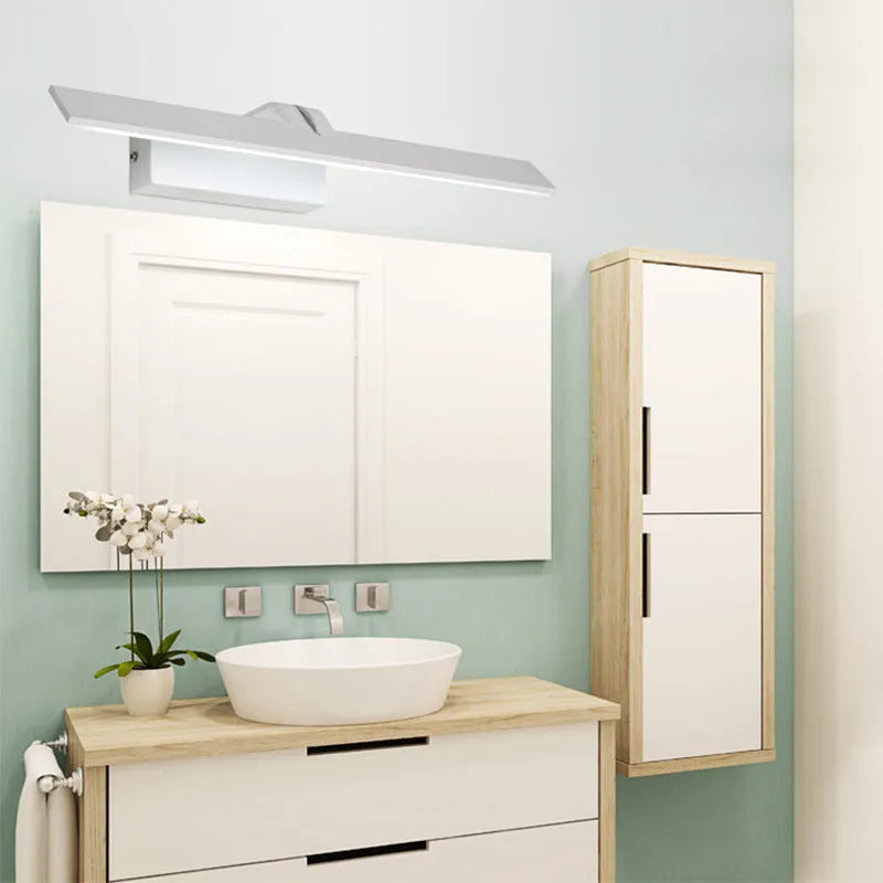 White LED bathroom mirror headlight with three-colour dimming on a vanity.