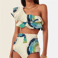 White one-shoulder women's swimsuit with large lotus leaf detail and high-leg split.