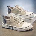 Men's soft-soled casual canvas shoes in beige with round toe and lace-up closure
