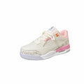 Pink lightweight basketball running shoe with microfiber upper, leather stitching, rubber sole and mesh lining