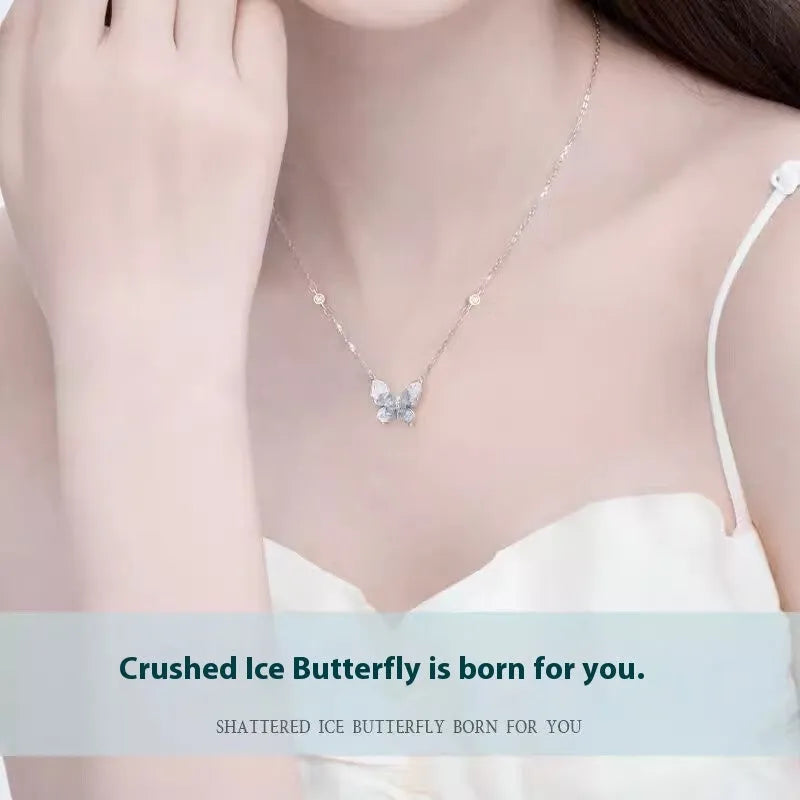 Close-up of a silver Bingyu Butterfly necklace with an ice rain pendant on an adjustable O-ring chain.