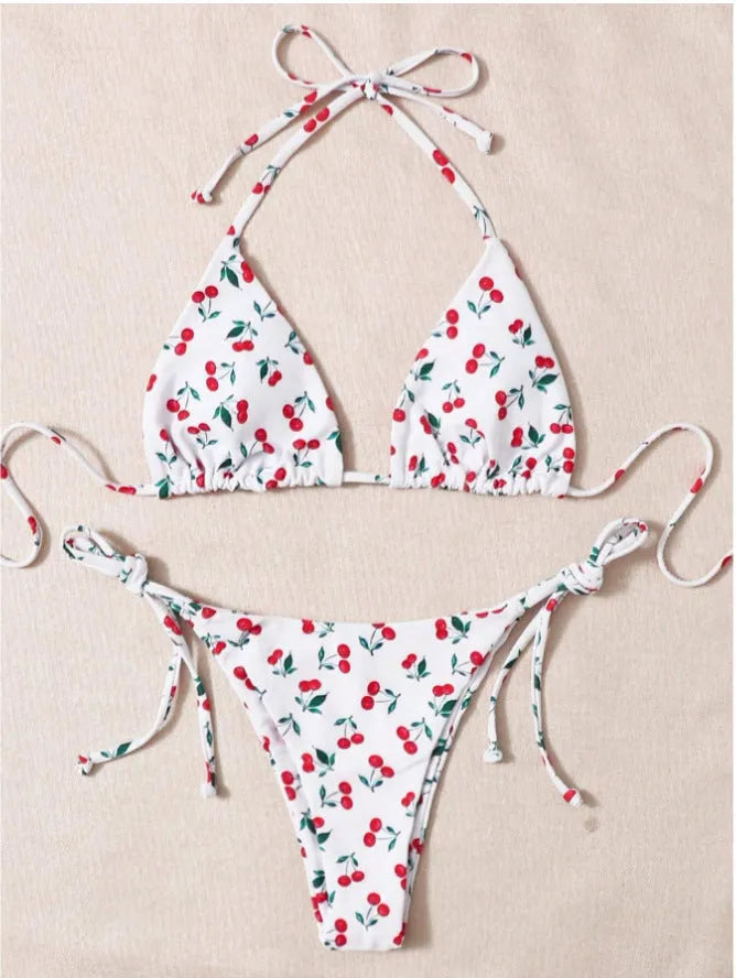 Solid colour halter neck bikini top with backless briefs in nylon.