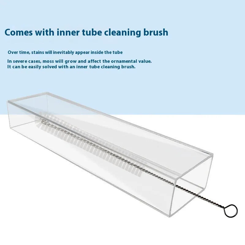 Aquarium feeding dish set with plastic tube, cleaning brush, and feeding spoon.