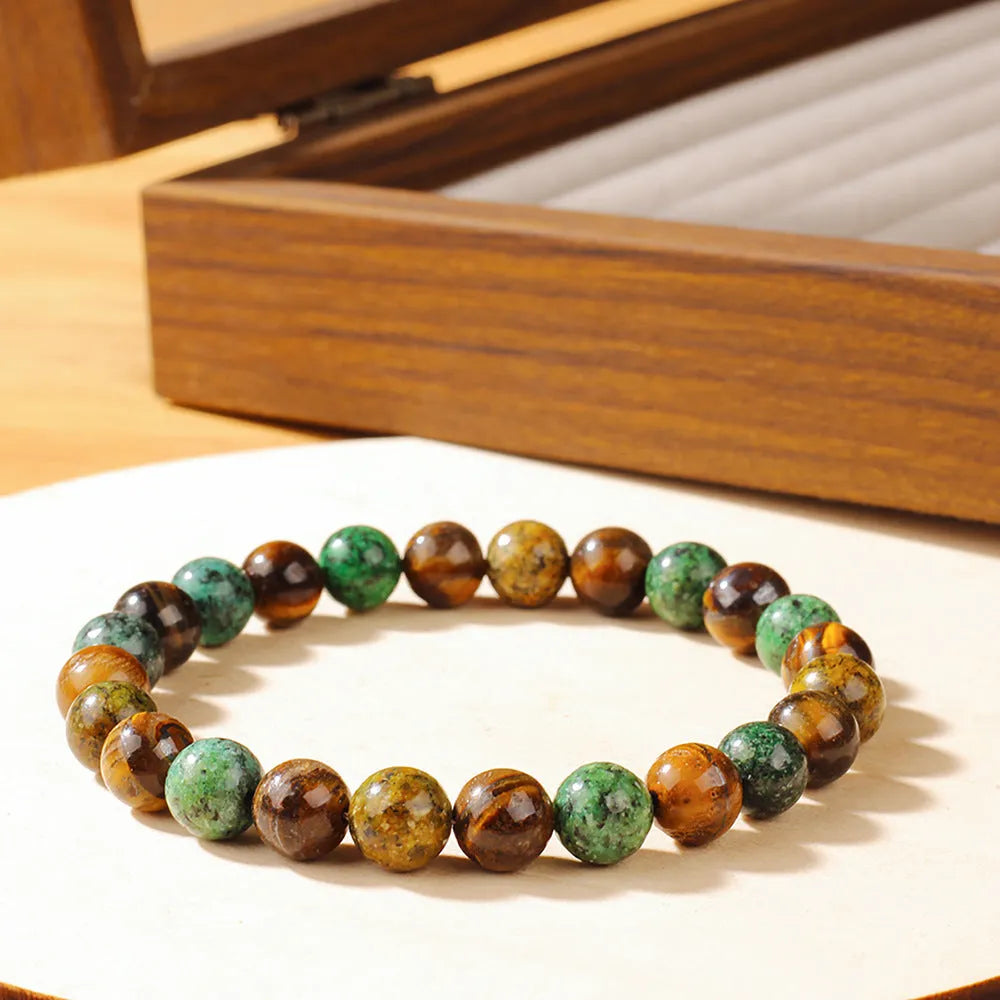 Tigereye stone bracelet with antique flower design measuring 18mm in L1805 colour