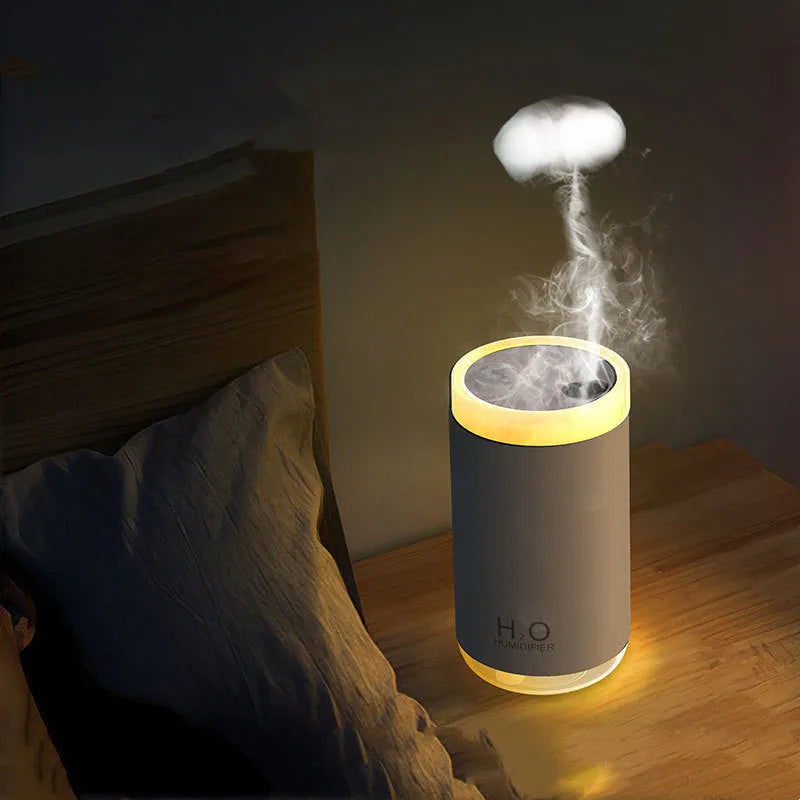 Jellyfish humidifier with warm night light showing smoke ring mist patterns
