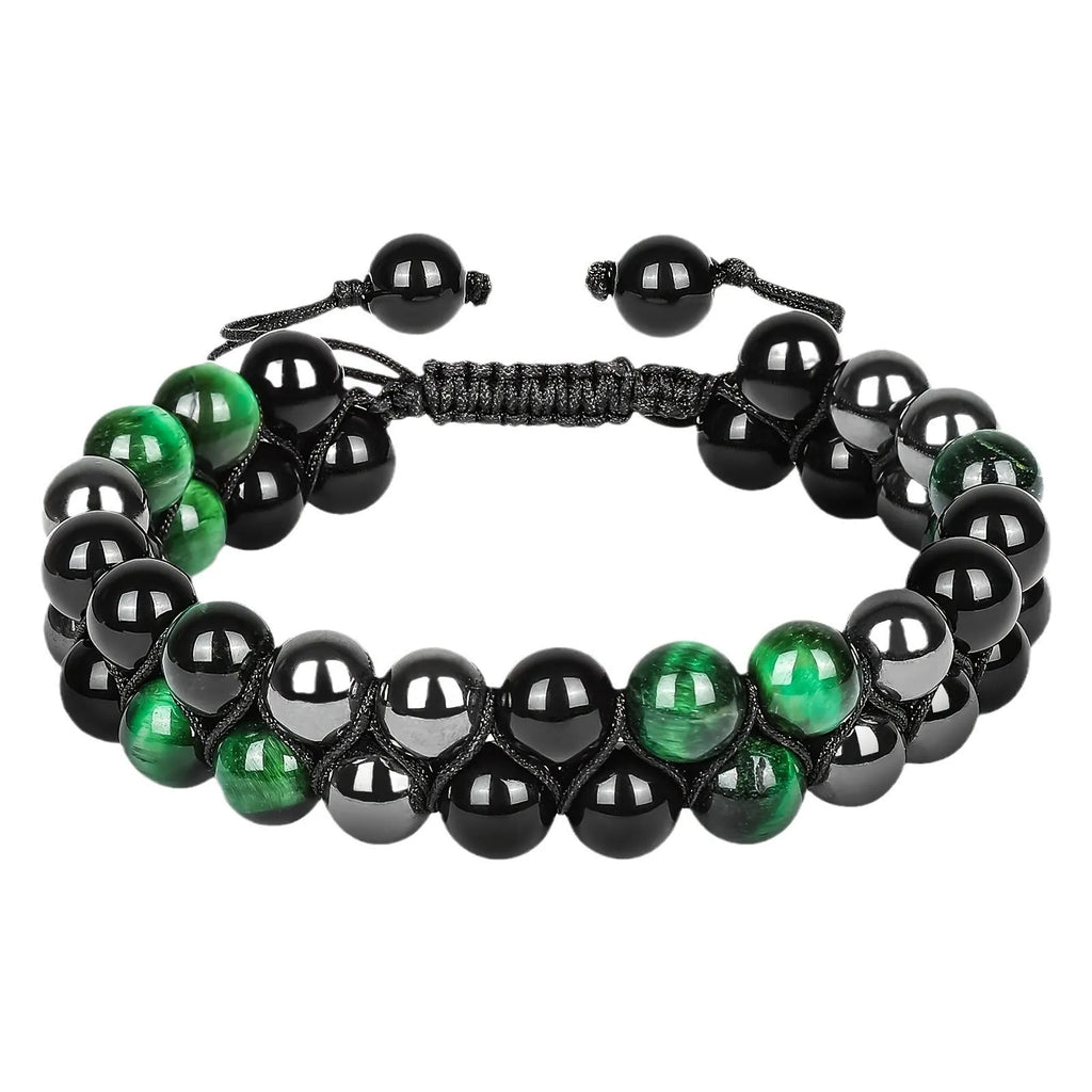A unisex Tiger's Eye gemstone bead bracelet with alloy details and auspicious elephant charms.