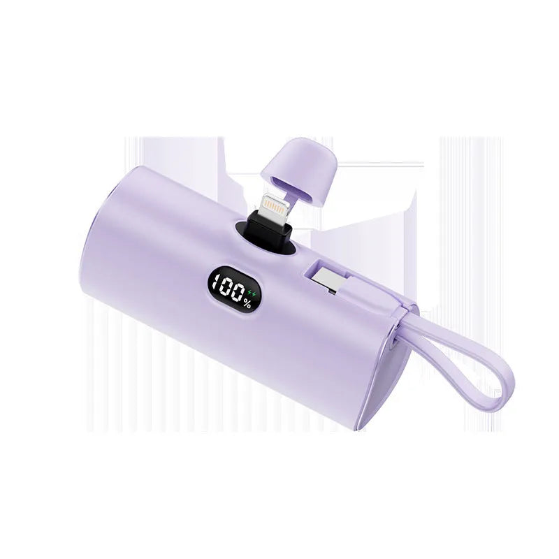 Capsule-shaped digital display wireless power bank in multiple colours with built-in plug.