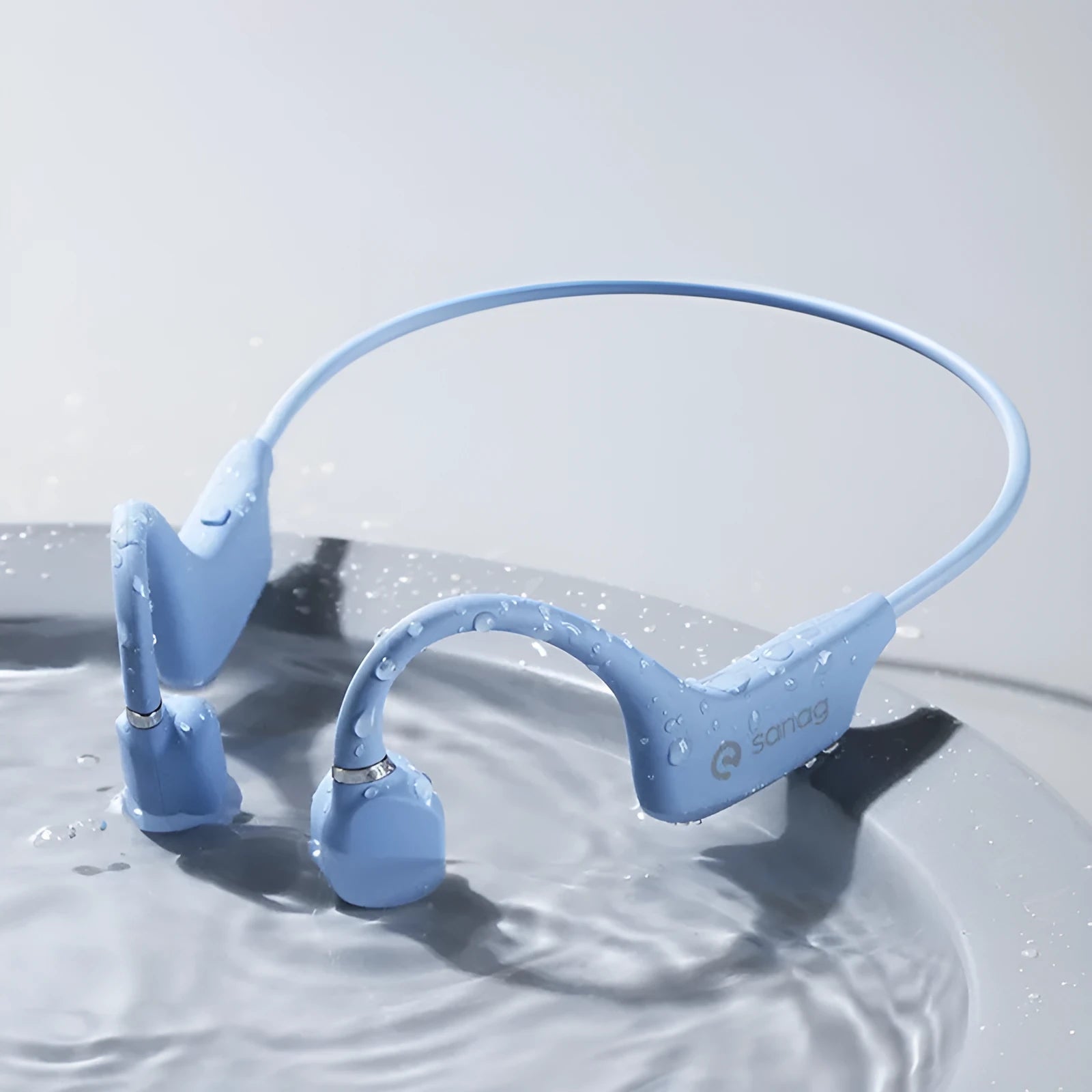 Bone conduction Bluetooth sports headset with neckband, shown in multiple colour variants.