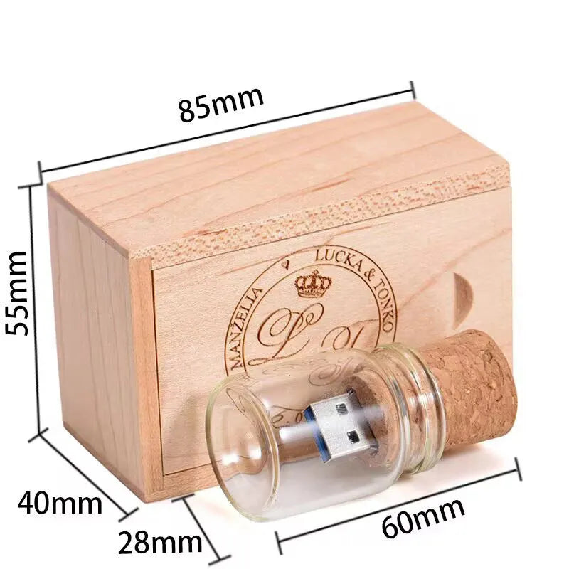 Transparent bottle-shaped USB flash drive on a wooden surface.